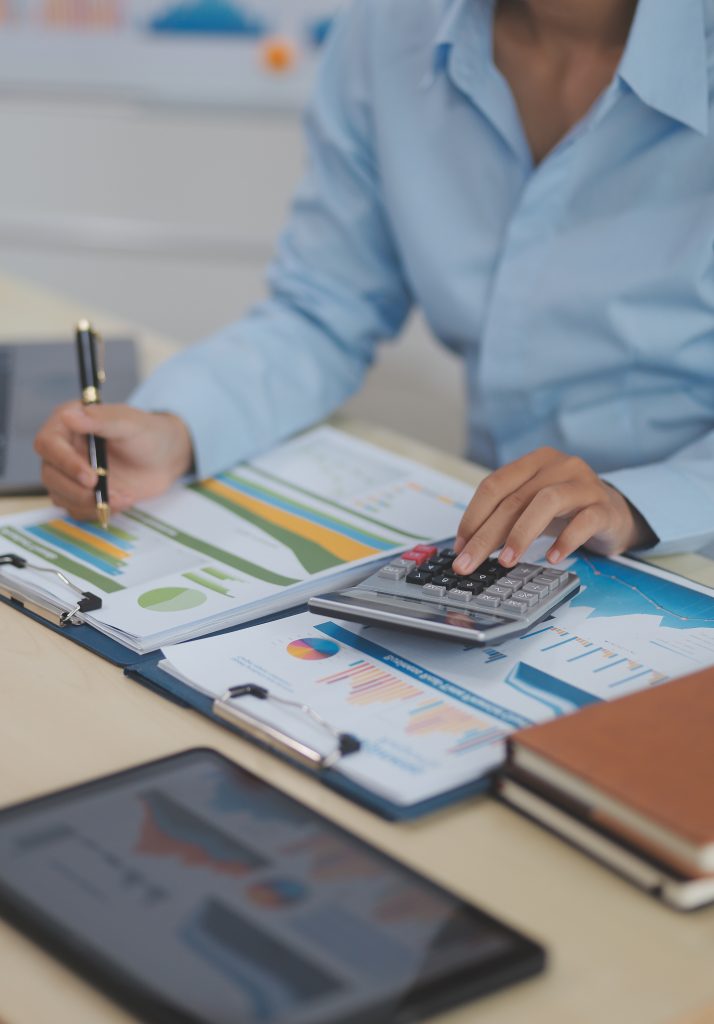 Accountant reviewing financial documents and reports